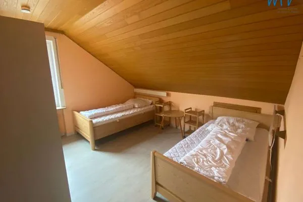 Schlafzimmer Ferienhaus Kiebitzdelle-Leegde 10 Ferienwohnung Backhaus