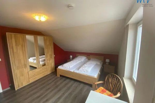 Schlafzimmer Ferienhaus Kiebitzdelle-Leegde 10 Ferienwohnung Backhaus