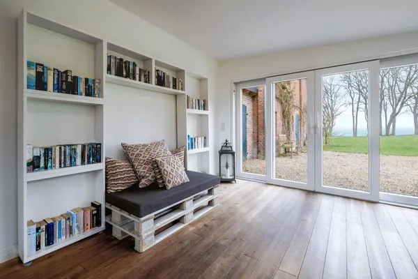 Wintergarten mit Meerblick, neben dem Wohnzimmer  Bauernhaus am Mühlendamm