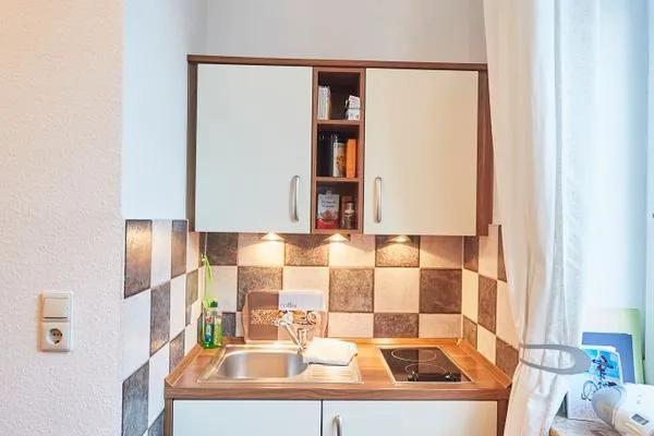 Küche / Küchenzeile  Haus am Leuchtturm - Ferienwohnung Sonne