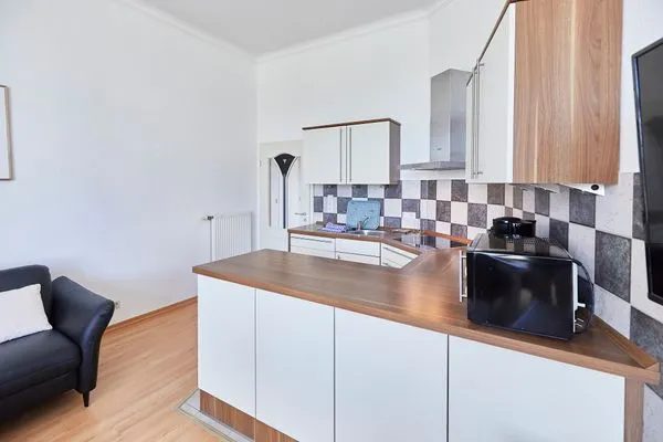 Küche / Küchenzeile  Haus am Leuchtturm - Ferienwohnung Mond