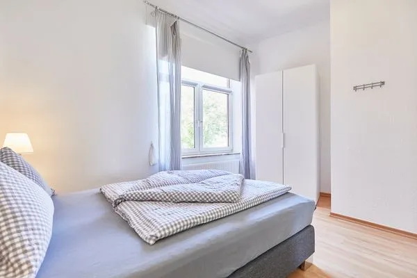 Schlafzimmer  Haus am Leuchtturm - Ferienwohnung Mond