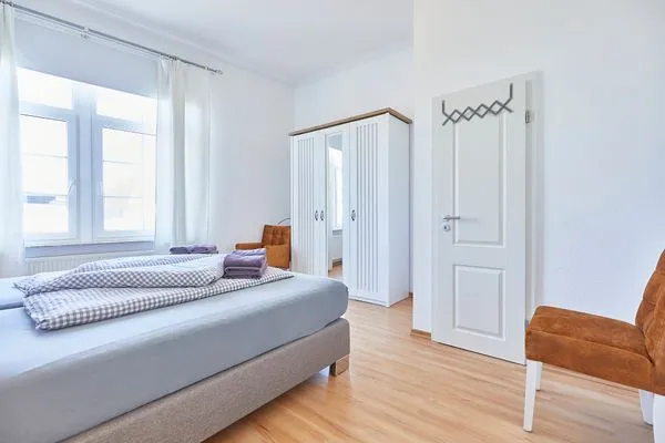 Schlafzimmer  Haus am Leuchtturm - Ferienwohnung Mond