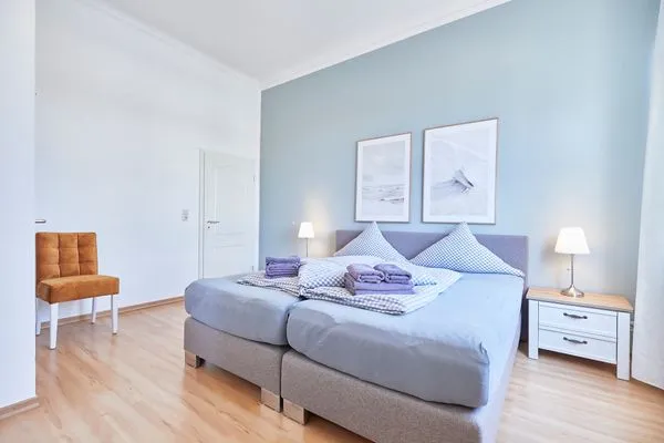 Schlafzimmer  Haus am Leuchtturm - Ferienwohnung Mond