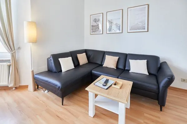 Wohnzimmer  Haus am Leuchtturm - Ferienwohnung Sterne