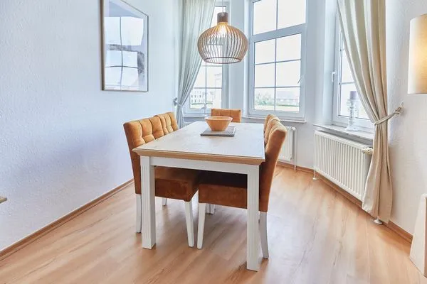 Wohnzimmer  Haus am Leuchtturm - Ferienwohnung Sterne