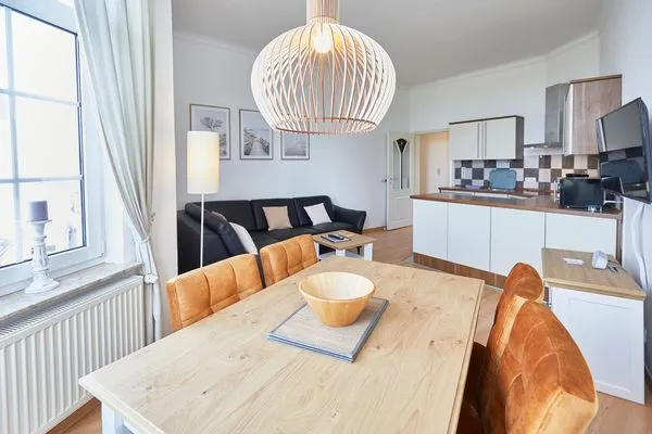 Wohnzimmer  Haus am Leuchtturm - Ferienwohnung Sterne