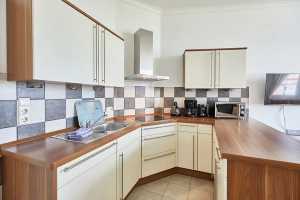 Küche / Küchenzeile  Haus am Leuchtturm - Ferienwohnung Sterne