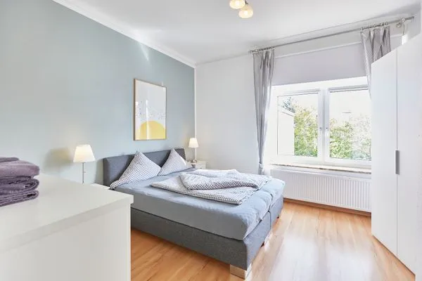 Schlafzimmer  Haus am Leuchtturm - Ferienwohnung Sterne