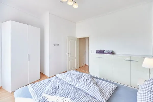 Schlafzimmer  Haus am Leuchtturm - Ferienwohnung Sterne