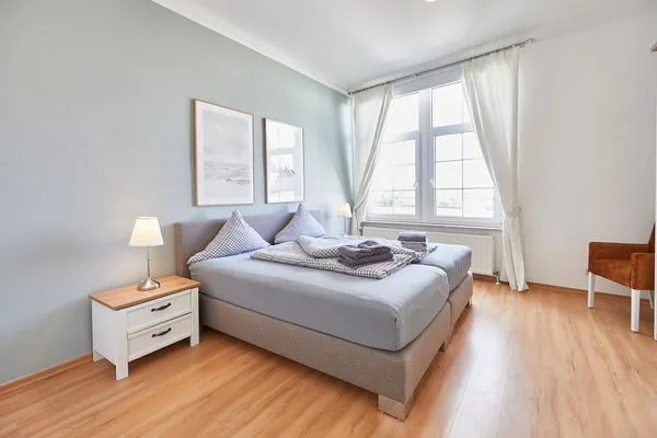 Schlafzimmer  Haus am Leuchtturm - Ferienwohnung Sterne
