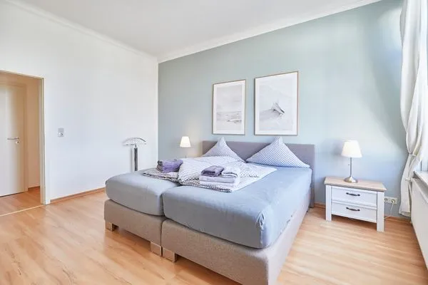 Schlafzimmer  Haus am Leuchtturm - Ferienwohnung Sterne