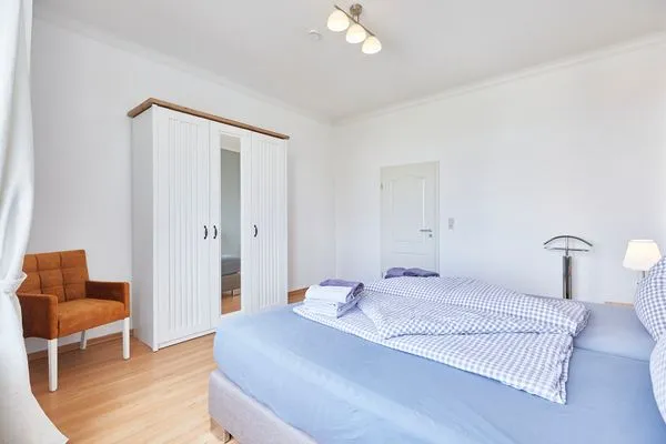 Schlafzimmer  Haus am Leuchtturm - Ferienwohnung Sterne
