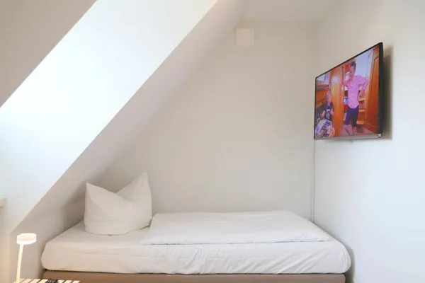 Schlafzimmer  Norderstr. 55a, Whg. 6, DG, LieblingsInsel