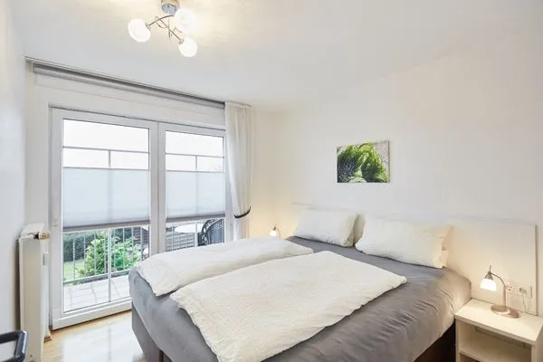 Schlafzimmer  Haus Strandloperke - Ferienwohnung Seehund