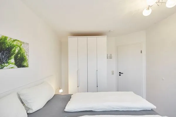 Schlafzimmer  Haus Strandloperke - Ferienwohnung Seehund