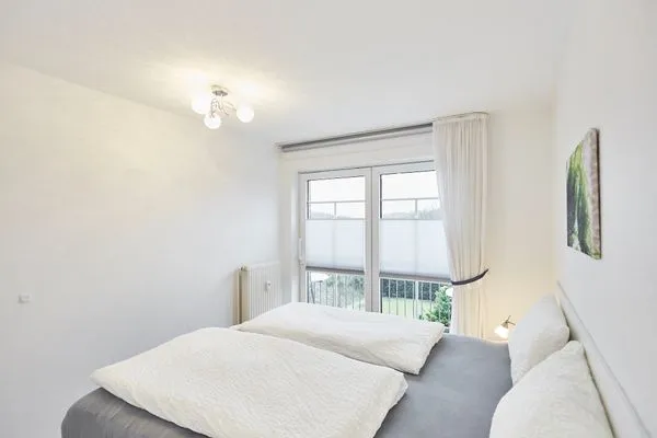 Schlafzimmer  Haus Strandloperke - Ferienwohnung Seehund