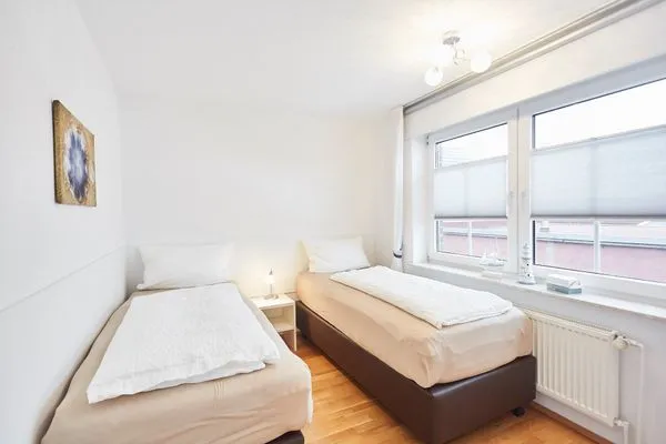 Schlafzimmer  Haus Strandloperke - Ferienwohnung Seehund