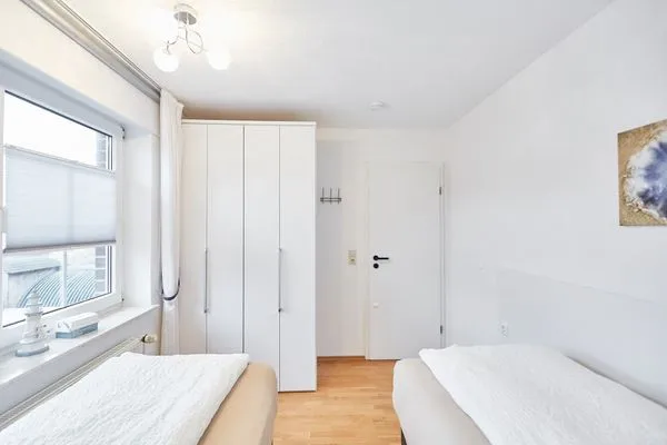 Schlafzimmer  Haus Strandloperke - Ferienwohnung Seehund