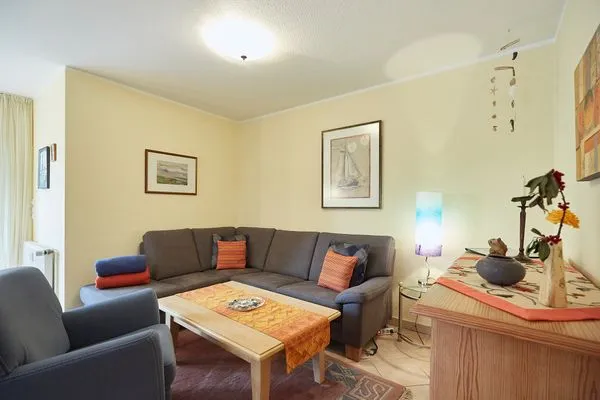 Wohnzimmer  Haus Inselherz - Ferienwohnung Muschel