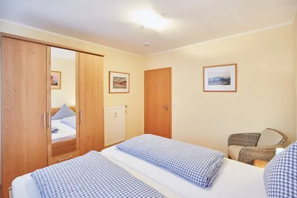 Schlafzimmer  Haus Inselherz - Ferienwohnung Muschel