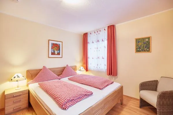 Schlafzimmer  Haus Inselherz - Ferienwohnung Muschel