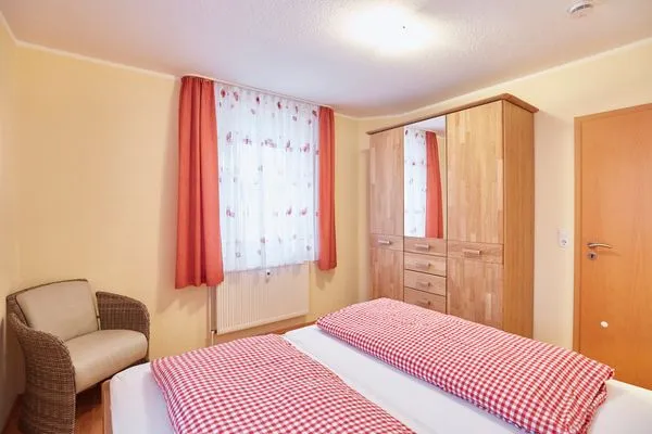 Schlafzimmer  Haus Inselherz - Ferienwohnung Muschel