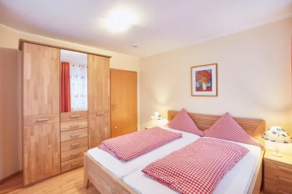 Schlafzimmer  Haus Inselherz - Ferienwohnung Muschel