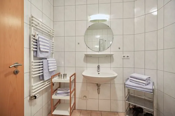 Badezimmer  Haus Inselherz - Ferienwohnung Muschel
