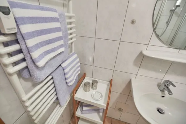 Badezimmer  Haus Inselherz - Ferienwohnung Muschel