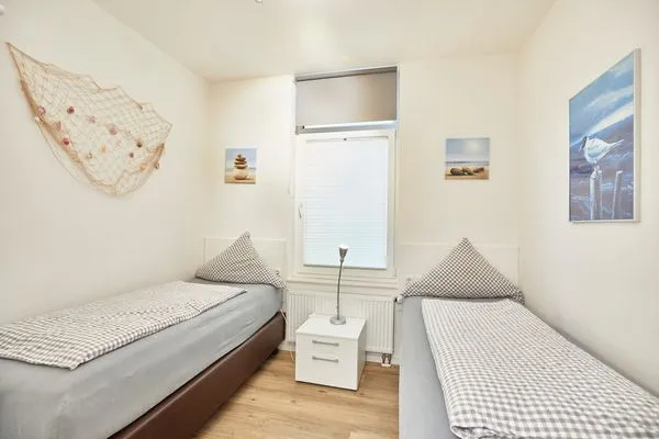 Schlafzimmer  Villa Pirola - Ferienwohnung 1