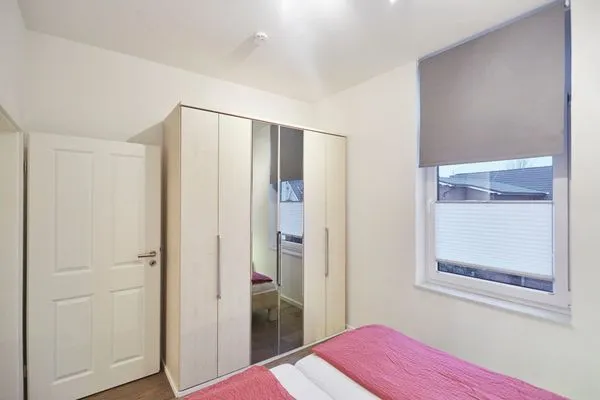 Schlafzimmer  Villa Pirola - Ferienwohnung 4