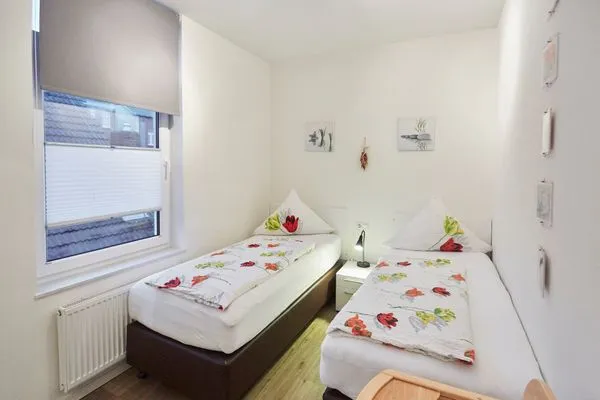 Schlafzimmer  Villa Pirola - Ferienwohnung 4