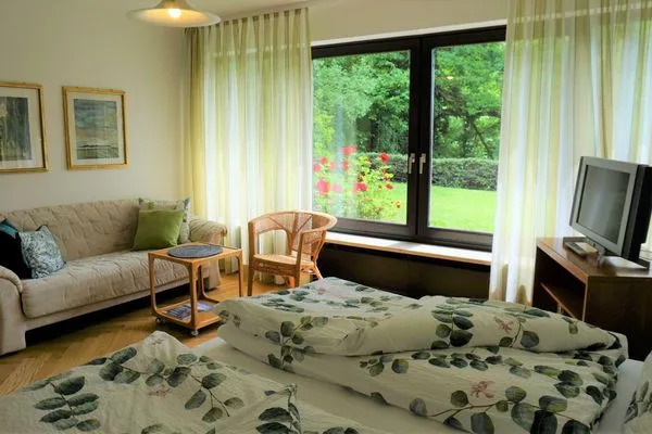 Wohnzimmer  Ferienwohnung Oase am Rosenhag