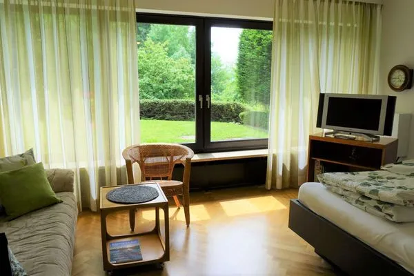 Wohnzimmer  Ferienwohnung Oase am Rosenhag