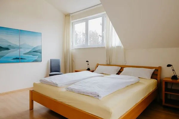 Schlafzimmer  Ferienhaus Hilde am Wald