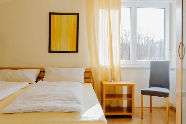 Schlafzimmer  Ferienhaus Emil am Wald