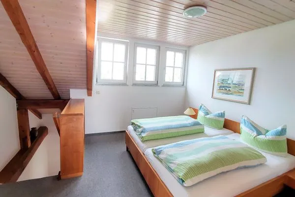 Schlafzimmer ABC Ferienwohnungen Maisonette-Wohnung B1****
