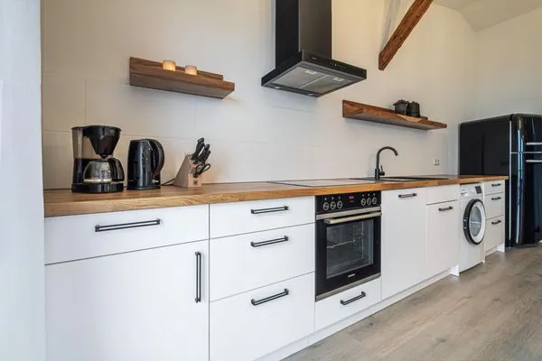 Küchenzeile umfangreich ausgestattet und mit Waschmaschine  Ostscheune am Mühlendamm