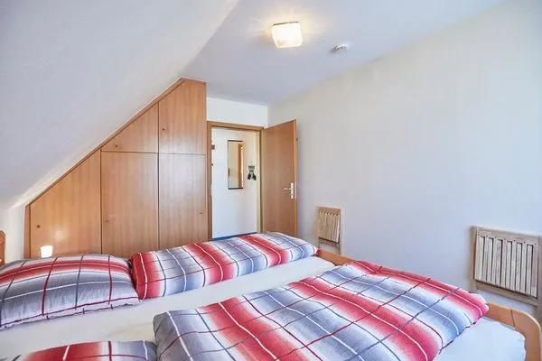 Schlafzimmer  Haus Seute Deern - Ferienwohnung 1 - Muschel
