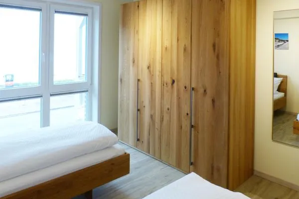 Schlafzimmer 2 der Ferienwohnung Weiße Düne 5 in Wittdün auf Amrum Haus *Weiße Düne* Ferienwohnung *Weiße Düne 5*