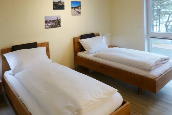 Schlafzimmer 2 der Ferienwohnung Weiße Düne 5 in Wittdün auf Amrum Haus *Weiße Düne* Ferienwohnung *Weiße Düne 5*