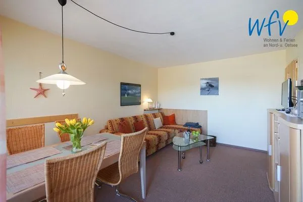 Wohnzimmer Haus Kiebitz Ferienwohnung Strandkörbchen