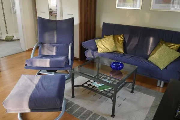 Gemütliche Sofaecke im Wohnzimmer  Ferienwohnung Villa Bourguet