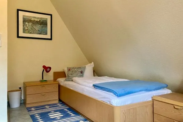 Schlafzimmer mit Einzelbetten Achtern Diek Achtern Diek 12b - Wohnung 5