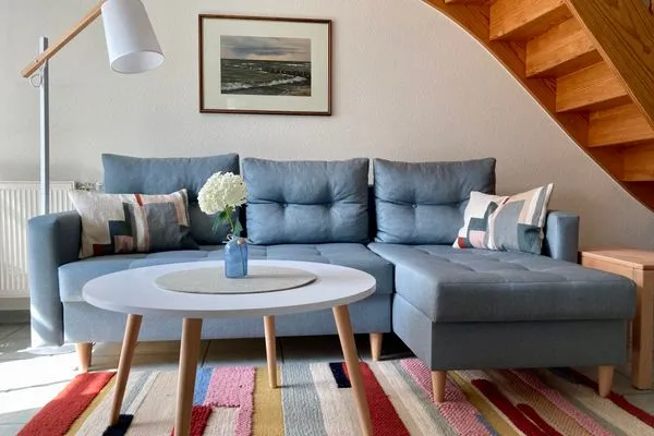 Wohnbereich mit Sofa Achtern Diek Achtern Diek 12b - Wohnung 5