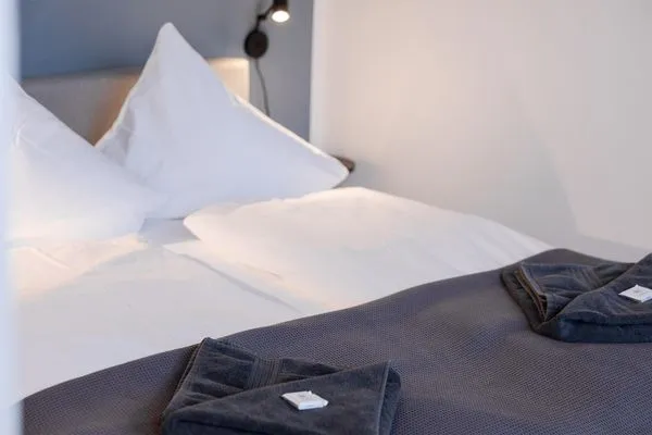 Bett  Meerzeit - direkt am Strand mit Frühstücksmöglichkeit