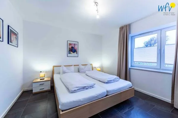 Schlafzimmer Haus Dünenrose Ferienwohnung Arielle