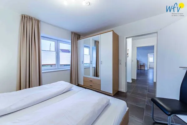 Schlafzimmer Haus Dünenrose Ferienwohnung Arielle