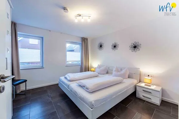 Schlafzimmer Haus Dünenrose Ferienwohnung Arielle